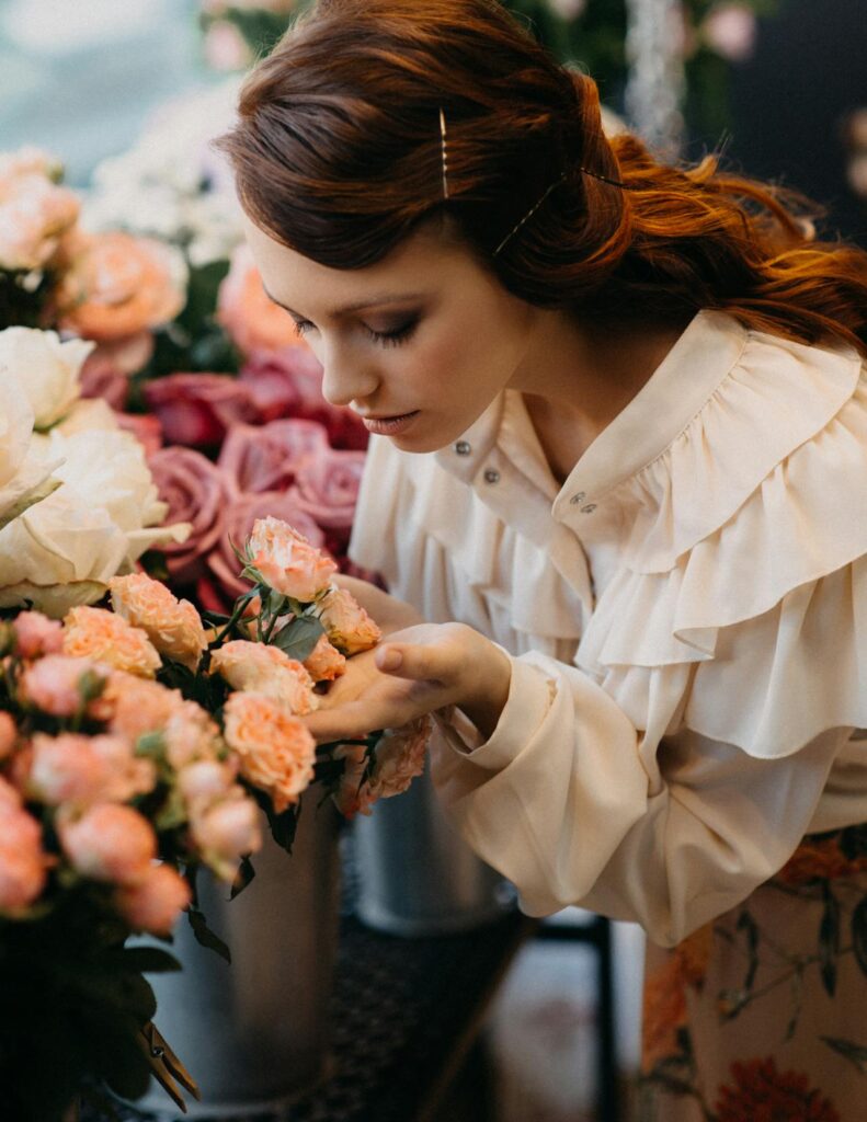 How can I incorporate the spiritual meaning of smelling roses into my daily life